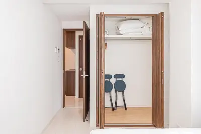 a room with a open door with a bunk bed at 67Apt Shinkoiwa in Tokyo