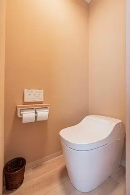 a bathroom with a white toilet in a room at Hotel Ginnan in Tokyo