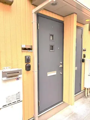 a door on the side of a building at Belle Lead 106 in Tokyo