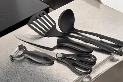 a pair of scissors and a spatula sitting on a counter at Max 9 people 8 minutes from Shibuya 5 minutes from Shinjuku 1 minute from Harajuku 4 minutes walk from the station Room Sakura in Tokyo