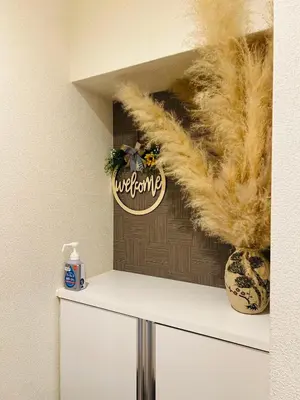 a room with a white cabinet with a faux fur wall at Ueno Uguisudani Tokan in Tokyo