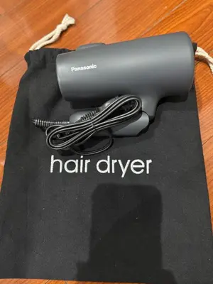 a hair dryer sitting on top of a table at Near Shibuya Station 4Beds 5Max A175 in Tokyo