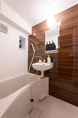 a bathroom with a sink and a bath tub and a toilet at Near Shibuya Station 4Beds 5Max A175 in Tokyo