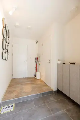 a living room with white walls and tile floors at Shinjuku large 3LDK 2 bathrooms, brand NEW house built in 2025 - Lotus Villa in Tokyo
