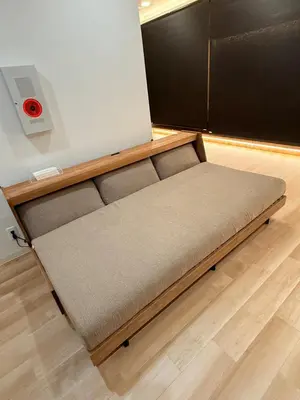 a bed in the corner of a room at Shinjuku large 3LDK 2 bathrooms, brand NEW house built in 2025 - Lotus Villa in Tokyo