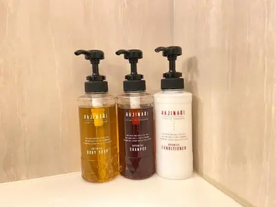a couple of bottles of liquids sitting on a sink at Smile Hotel Tokyo Nishikasai - Vacation STAY 97145v in Tokyo
