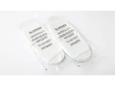 two white toothbrushes are in a plastic bag at Smile Hotel Tokyo Nishikasai - Vacation STAY 97283v in Tokyo