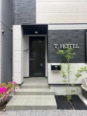 a building with a t hospital sign on the door at T-HOTEL Iriya - Vacation STAY 94071v in Tokyo