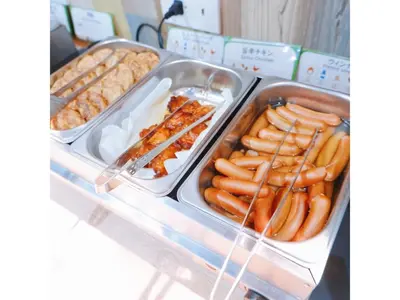 a buffet filled with hot dogs and other foods at Kamata Inn Social - Vacation STAY 03309v in Tokyo