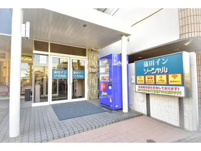 a store front of a building with a sign on it at Kamata Inn Social - Vacation STAY 03328v in Tokyo