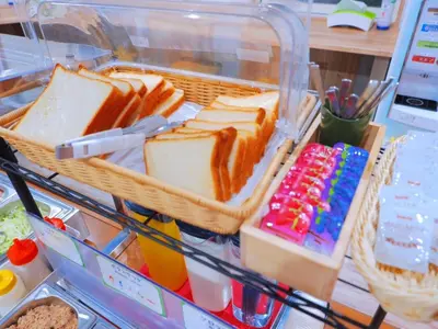 a refrigerator filled with slices of bread and drinks at Kamata Inn Social - Vacation STAY 03324v in Tokyo