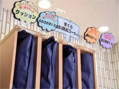 a room with blue curtains and signs on the wall at Kamata Inn Social - Vacation STAY 03324v in Tokyo