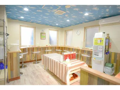 a large room with a kitchen with a refrigerator at Kamata Inn Social - Vacation STAY 03314v in Tokyo