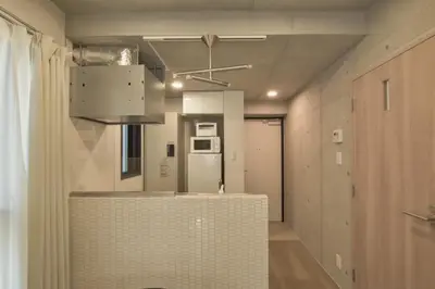 a kitchen with a counter top in a room at La Residence East Tokyo301 - Vacation STAY 19857 in Tokyo