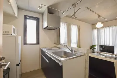 a kitchen with a sink and a refrigerator at 3-17-9 Mukojima - Vacation STAY 19858 in Tokyo