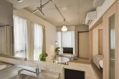 a kitchen and living room with a sink and a mirror at 3-17-9 Mukojima - Vacation STAY 19858 in Tokyo