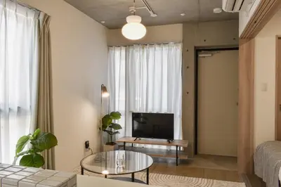 a living room with a couch and a tv at 3-17-9 Mukojima - Vacation STAY 19858 in Tokyo