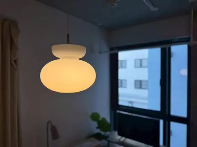 a light fixture hanging from a wall next to a window at La Residence East Tokyo202 - Vacation STAY 19859 in Tokyo