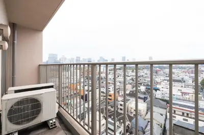 a balcony with a view of a city at \u6771\u6025\u30b9\u30c6\u30a4\u56db\u8c37 in Tokyo