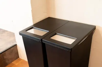 a black cabinet with two windows in a room at \u6674\u30ec\u5c4b\u6d45\u8349 Hareya Asakusa in Tokyo