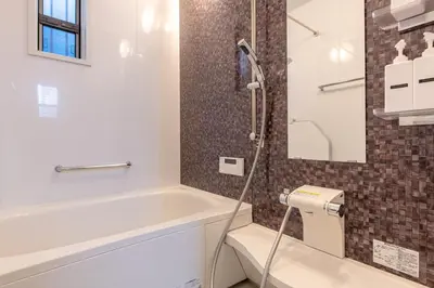 a bathroom with a bath tub and a shower at Detached house in Oshima 4chome, one train ride to Shinjuku \u5927\u5cf64\u4e01\u76ee in Tokyo
