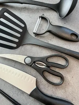 a pair of scissors and a knife on a table at Detached house in Oshima 4chome, one train ride to Shinjuku \u5927\u5cf64\u4e01\u76ee in Tokyo
