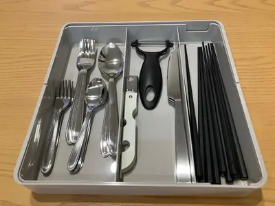 a plastic tray with utensils on a table at PRISM Inn Tateishi in Tokyo
