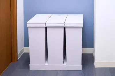 a white counter in a room with a wall at willcourt in Tokyo
