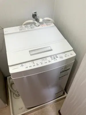 a white washer and dryer in a bathroom at Tokyo Stay sugamo House in Tokyo