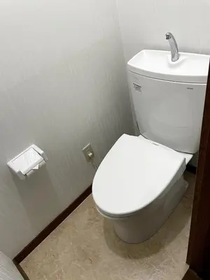 a bathroom with a white toilet and a sink at Tokyo Stay sugamo House in Tokyo