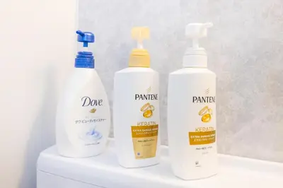 three bottles of cleaning products sitting on top of a toilet at Ikebukuro 8 min walk, Kanamecho 6 min walk, 25sqm room, 2 guests, Direct access to Shinjuku, Shibuya, Tokyo, Ueno, 1 double bed in Tokyo