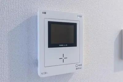 a white electrical outlet with a tv on a wall at Open Sale Asakusa Skytree Hotel like space 3 minutes from the station in Tokyo