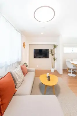 a living room with a couch and a table at \u5343\u5c0b 130t in Tokyo