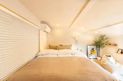a bedroom with a large bed in a room at \u745e\u6c90 128t in Tokyo
