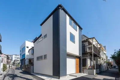 a house with a black and white facade at \u745e\u6c90 128t in Tokyo