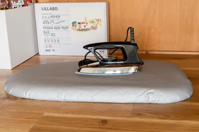 a iron sitting on top of a pillow on a floor at Maison Nagasaki Five 4F MN4 in Tokyo