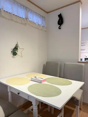 a dining room table with a book on top of it at Ikebukuro\u99c5\u304b\u3089\u5f92\u6b698\u5206\u6700\u59278\u4eba\u6728\u6728\u65e7\u9928 in Tokyo