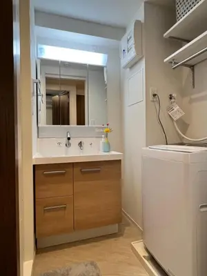a bathroom with a sink and a mirror at nestay apartment tokyo skytree in Tokyo