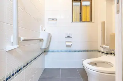 a bathroom with a toilet and a window at Asakusa Cozy Japanese House with Tatami & Projector, 5min to Station in Tokyo