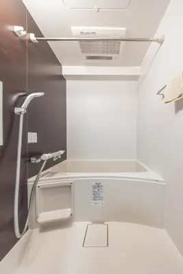 a bathroom with a shower and a sink at 201 Direct access to Narita Haneda 5-minute walk to Keikyu Kamata Station, with kitchen, ideal for telework, apartment in Tokyo