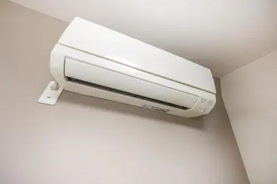 a white paper towel dispenser on a wall at 201 Direct access to Narita Haneda 5-minute walk to Keikyu Kamata Station, with kitchen, ideal for telework, apartment in Tokyo