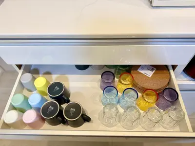a drawer in a refrigerator filled with different colored jars at Entire house, 3 minutes on foot from Ekoda station, 2 stations by train to Harry Potter, direct access to Ikebukuro,Shinjuku,Shibuya,Roppongi in Tokyo