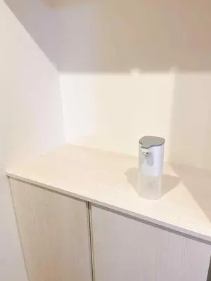 a white counter with a trash can on top of it at Entire house, 3 minutes on foot from Ekoda station, 2 stations by train to Harry Potter, direct access to Ikebukuro,Shinjuku,Shibuya,Roppongi in Tokyo
