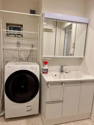 a kitchen with a washing machine and a sink at Entire house, 3 minutes on foot from Ekoda station, 2 stations by train to Harry Potter, direct access to Ikebukuro,Shinjuku,Shibuya,Roppongi in Tokyo