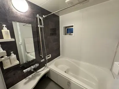 a bathroom with a white tub and a sink at Entire house, 3 minutes on foot from Ekoda station, 2 stations by train to Harry Potter, direct access to Ikebukuro,Shinjuku,Shibuya,Roppongi in Tokyo