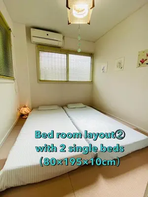 a bedroom with a bed room layout with single beds at Pearl Heights 102 Traditional Japanese-style private apartment for 1-4 people, close to Ikebukuro Shinjuku business district in Tokyo