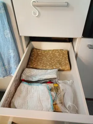 a drawer filled with towels in a cabinet at Pearl Heights 301 suit room, Easy access to Ikebukuro Shinjuku Station in Tokyo