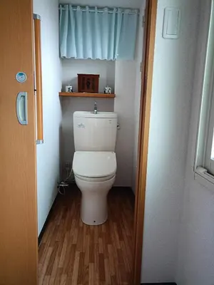 a bathroom with a white toilet in a room at Pearl Heights 301 suit room, Easy access to Ikebukuro Shinjuku Station in Tokyo
