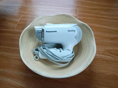 a sewing machine on a plate on a table at Pearl Heights 201 Easy access to Ikebukuro Shinjuku, Cozy 1 room in Tokyo