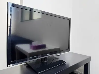 a television screen with a purple box on a table at Tokyo Stay Top Ikebukuro #103 in Tokyo
